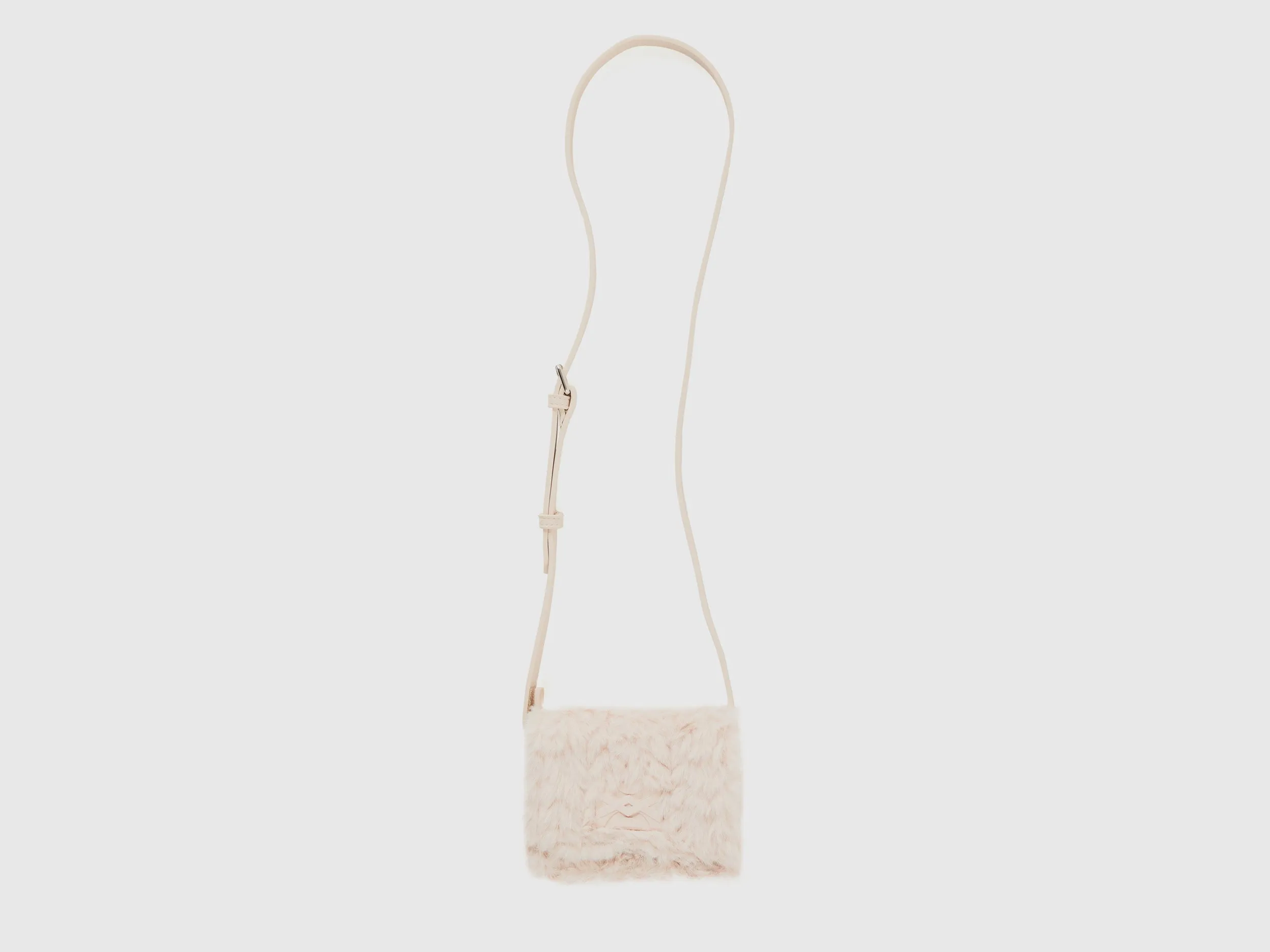 Textured Sling Bag with Spacious Interior and Secure Buckle Closure